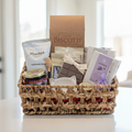 Luxury coffee tea basket with artisan chocolate and gourmet treats in a woven basket