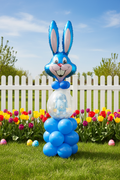 Blue Easter balloon bunny arrangement with outdoor garden background